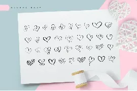 Lovingly Symbol Flourish Hearts Font